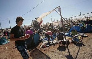 Campers return to the Benicassim campsite after the freak storms