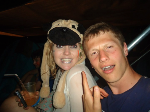 Sam with a girl wearing a dog hat